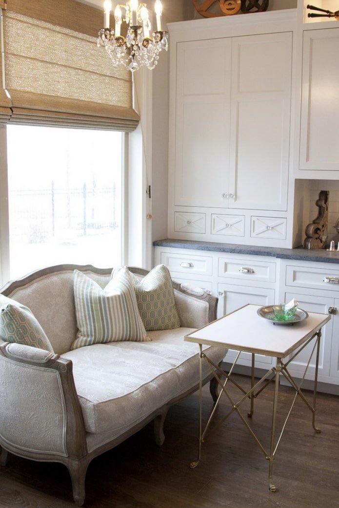 sofa on legs in the kitchen interior