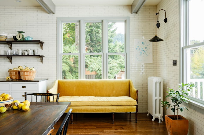 sofa on legs in the kitchen interior