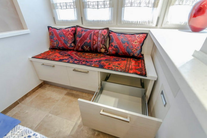 sofa with storage drawers in the kitchen interior