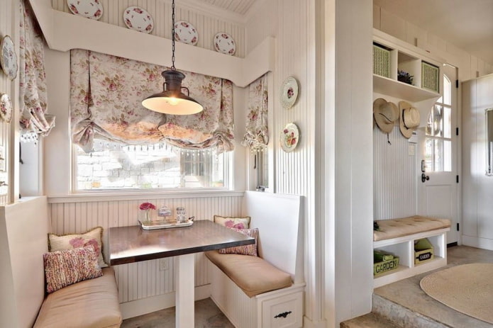 sofa in the kitchen interior in loft style provence