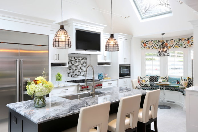 Island in a kitchen with a bay window