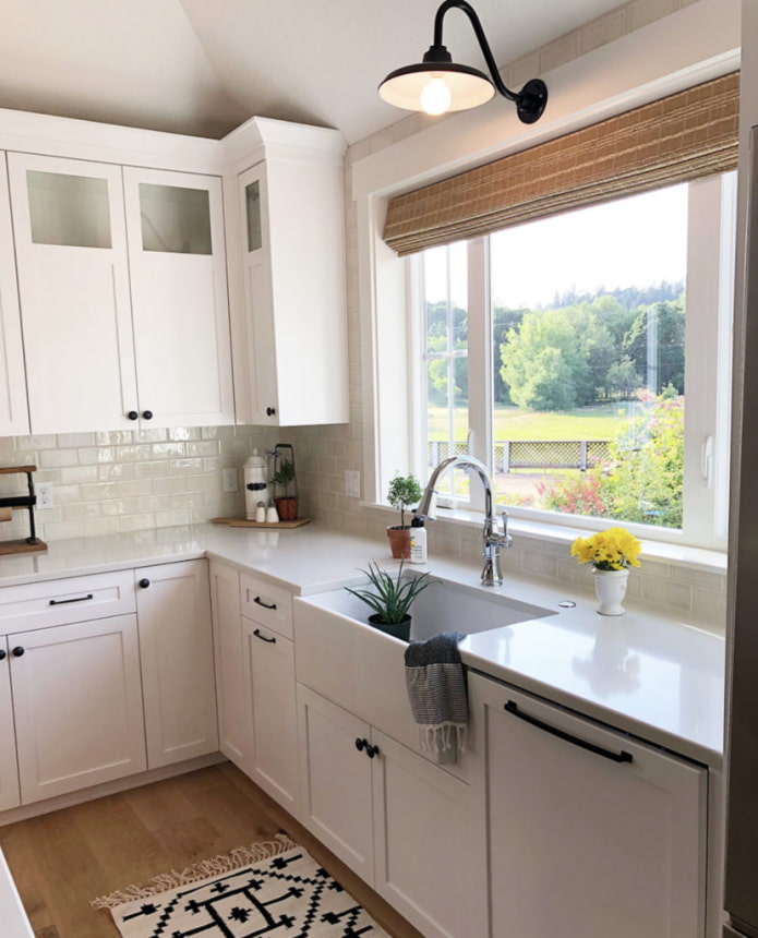 kitchen with a sink by the window