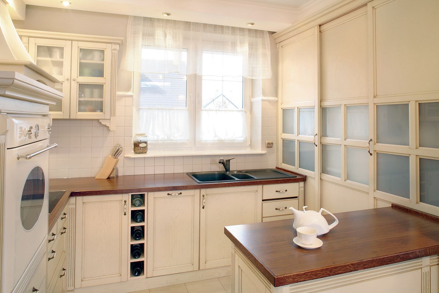 black sink by the window in the corner
