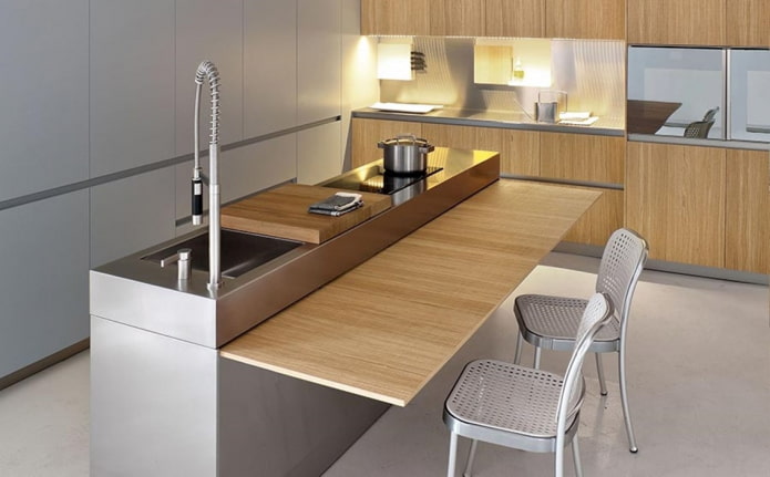 island with dining table in the kitchen interior