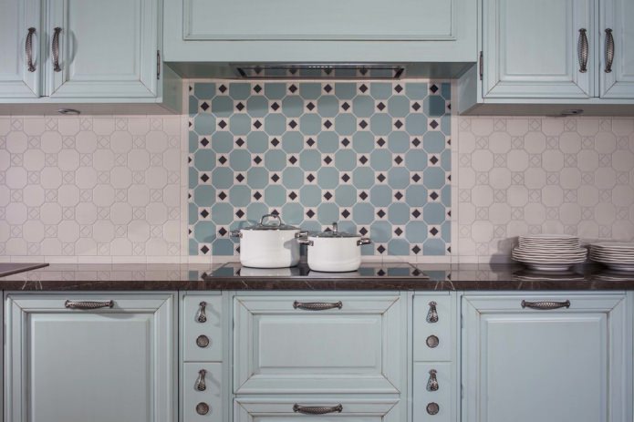 white and blue apron and dark countertop