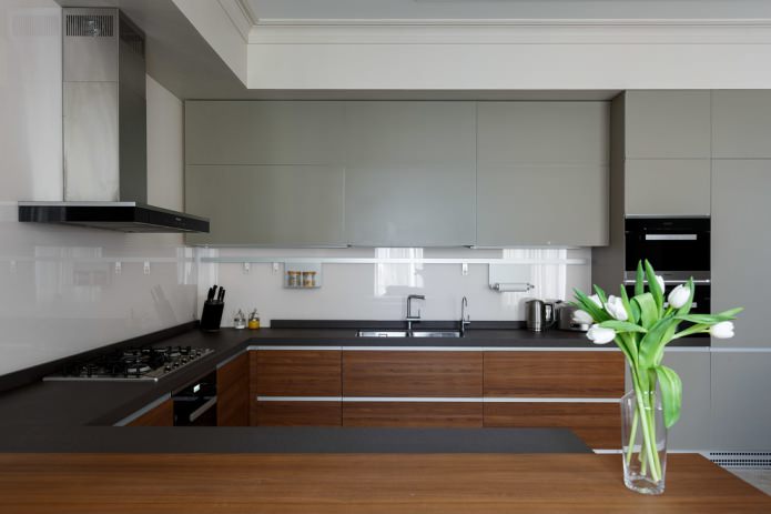 white glass apron with a dark gray countertop
