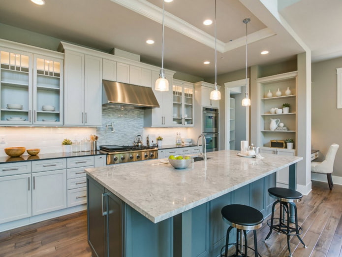 Kitchen with an island in the house
