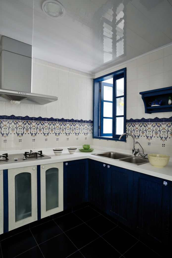 Blue cabinets, open shelf