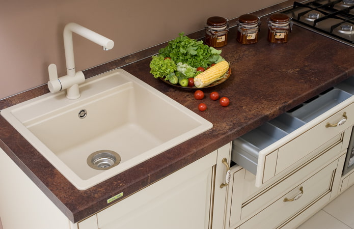 white sink made of artificial stone in the interior