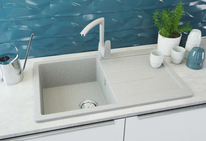 sink with a draining wing made of artificial stone