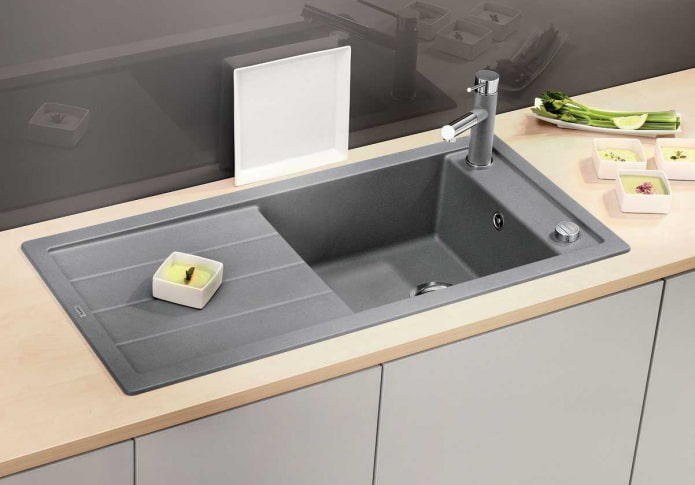 narrow sink made of artificial stone