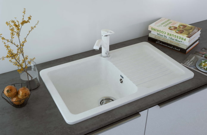white sink made of artificial stone in interior