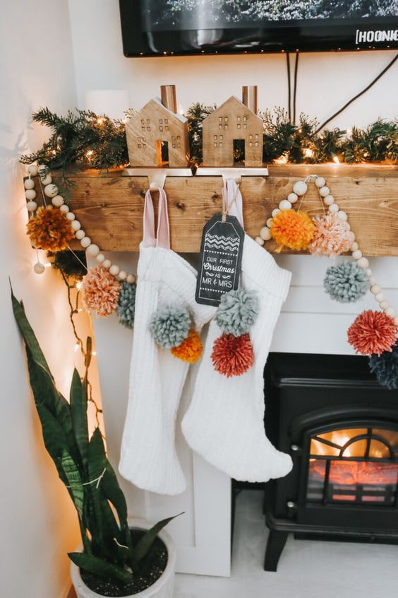 Socks and garlands on the fireplace