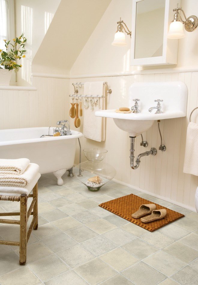 quartz vinyl tiles under porcelain tiles in the bathroom
