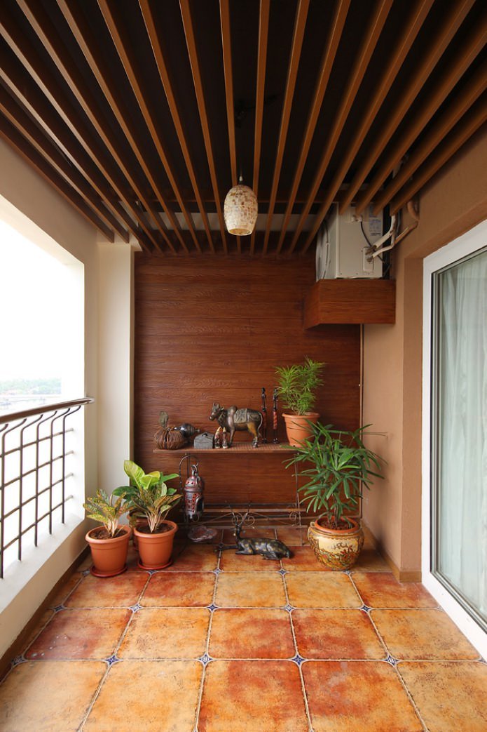 open balcony with a wooden wall