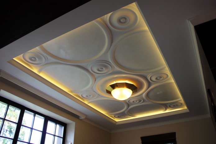 stucco decor on the ceiling with lighting