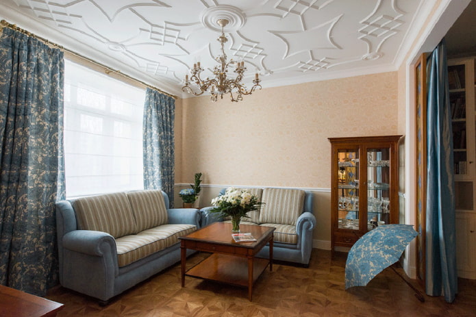 stucco decor on a painted ceiling