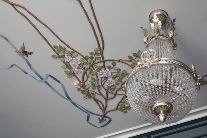 stucco decor in the form of flowers on the ceiling
