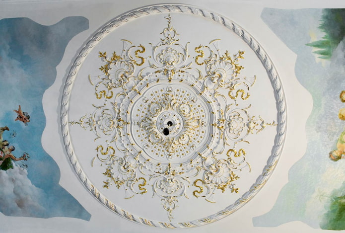stucco decor with painting on the ceiling