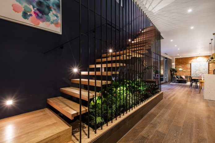 staircase in the interior of the house in the loft style