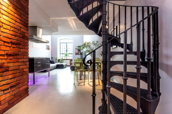 staircase in the interior of the house in the loft style