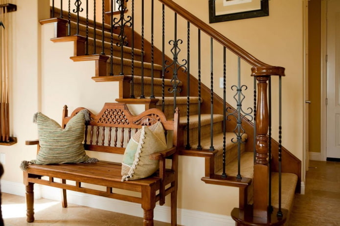 staircase in the interior of a house in country style