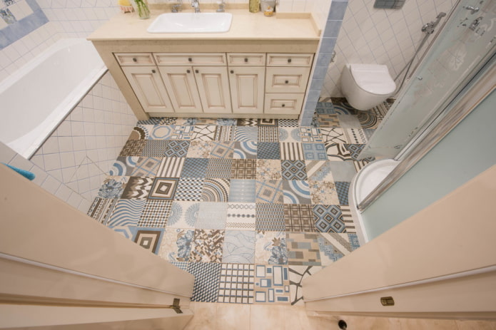 linoleum under patchwork tiles in the bathroom