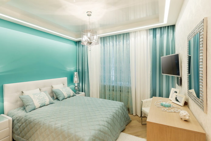 stretch ceiling with a chandelier in the bedroom