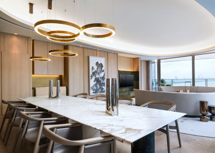 stretch ceiling with a chandelier in interior design