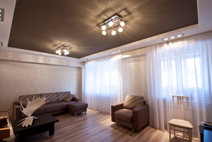 stretch ceiling with a chandelier in the interior