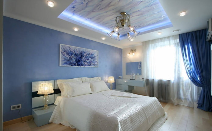 stretch ceiling with a chandelier in the interior