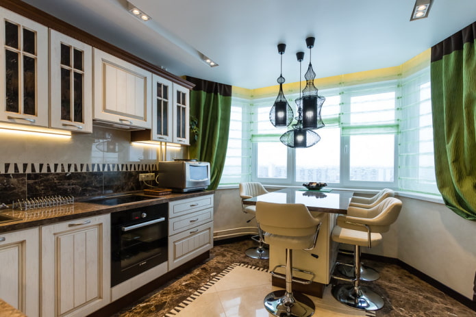 chandelier over the island in the kitchen interior