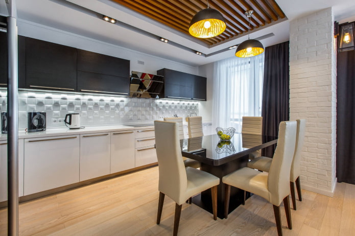 two chandeliers on the ceiling in the kitchen interior