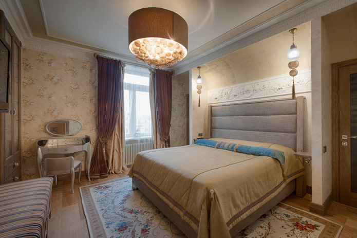 chandelier on the ceiling in the bedroom interior