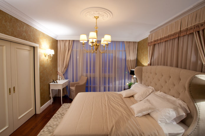 chandelier on the ceiling in the bedroom interior