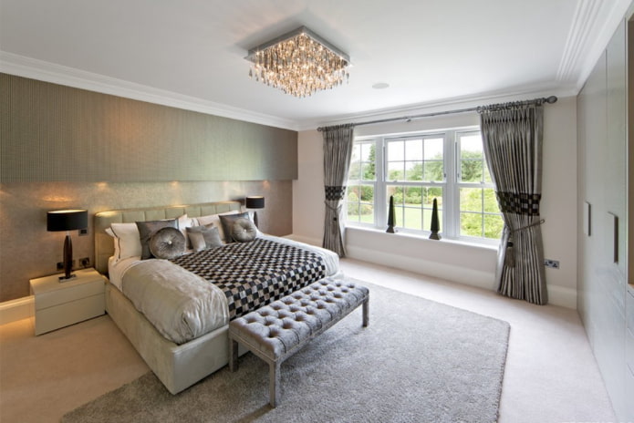 chandelier on the ceiling in the bedroom interior