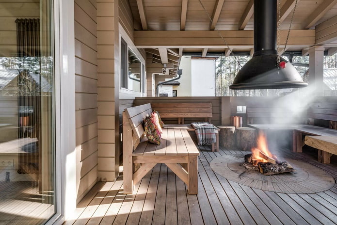 veranda with a fire pit