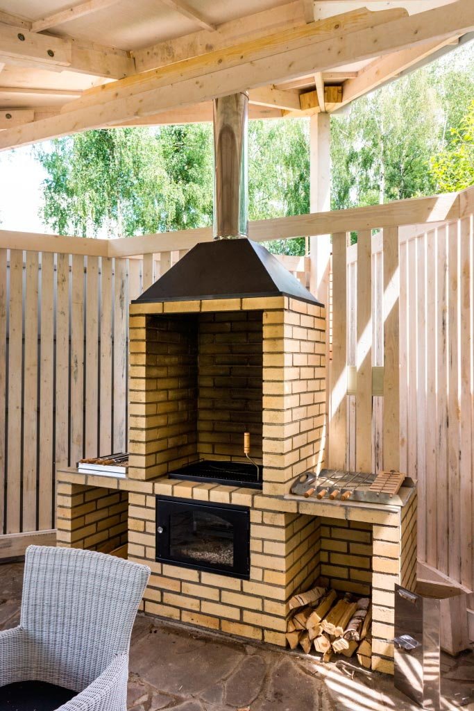 barbecue with a chimney at the dacha