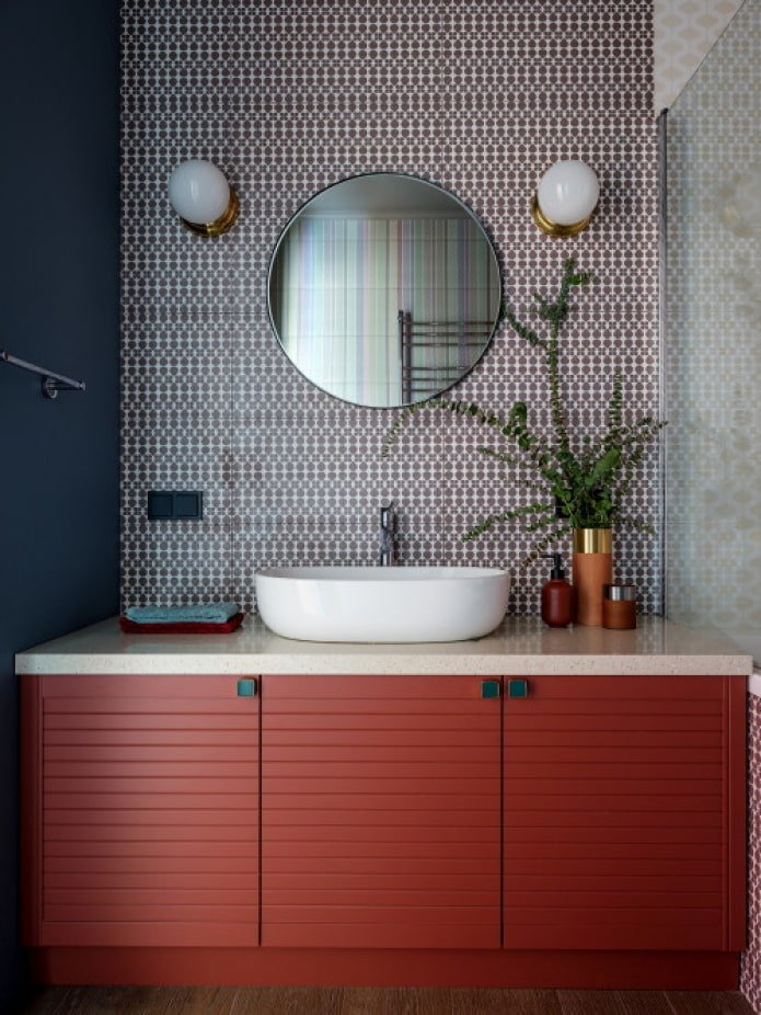 bathroom with a red cabinet