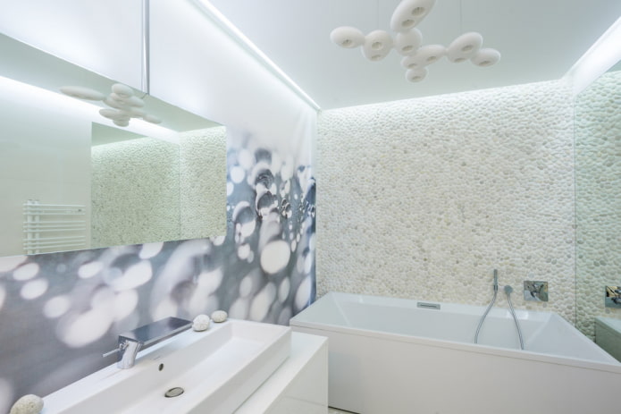 pebbles on the wall in the bathroom interior