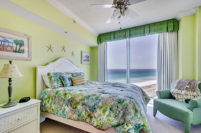 green bedroom with mint armchair