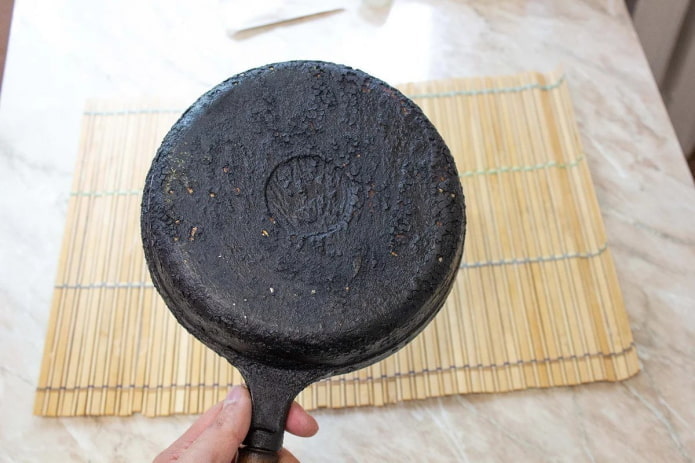 cast iron pan with carbon deposits