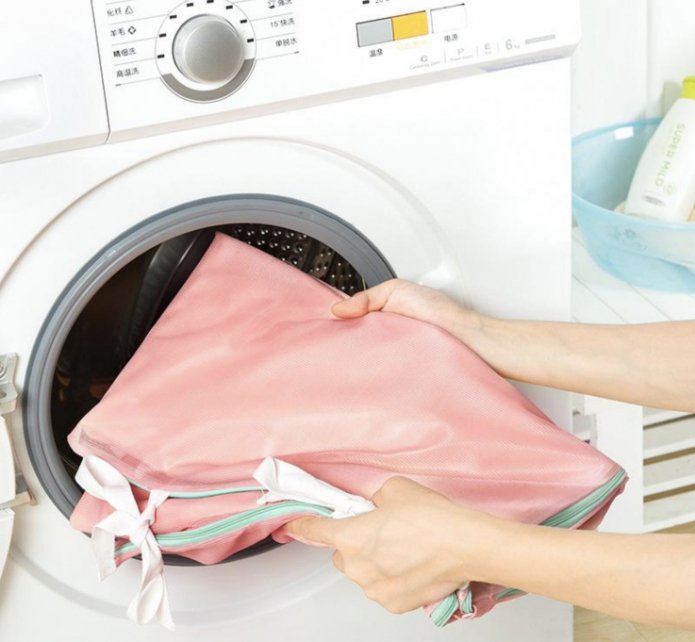 put the curtains in the machine
