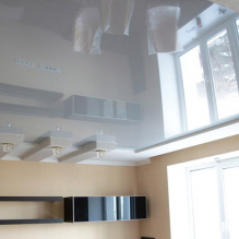 Variants of design of stretch ceilings in the kitchen-3