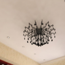 Variants of design of stretch ceilings in the kitchen-13