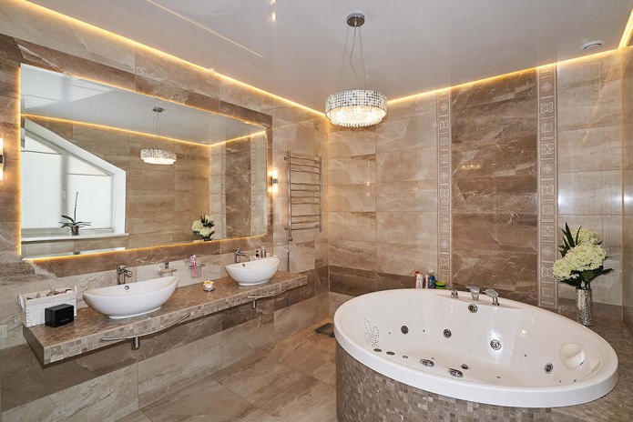 bathroom with chandelier 