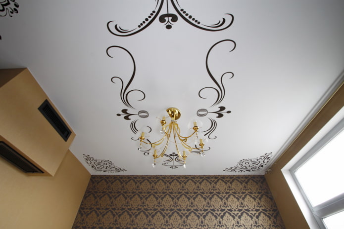stretched ceiling with openwork patterns