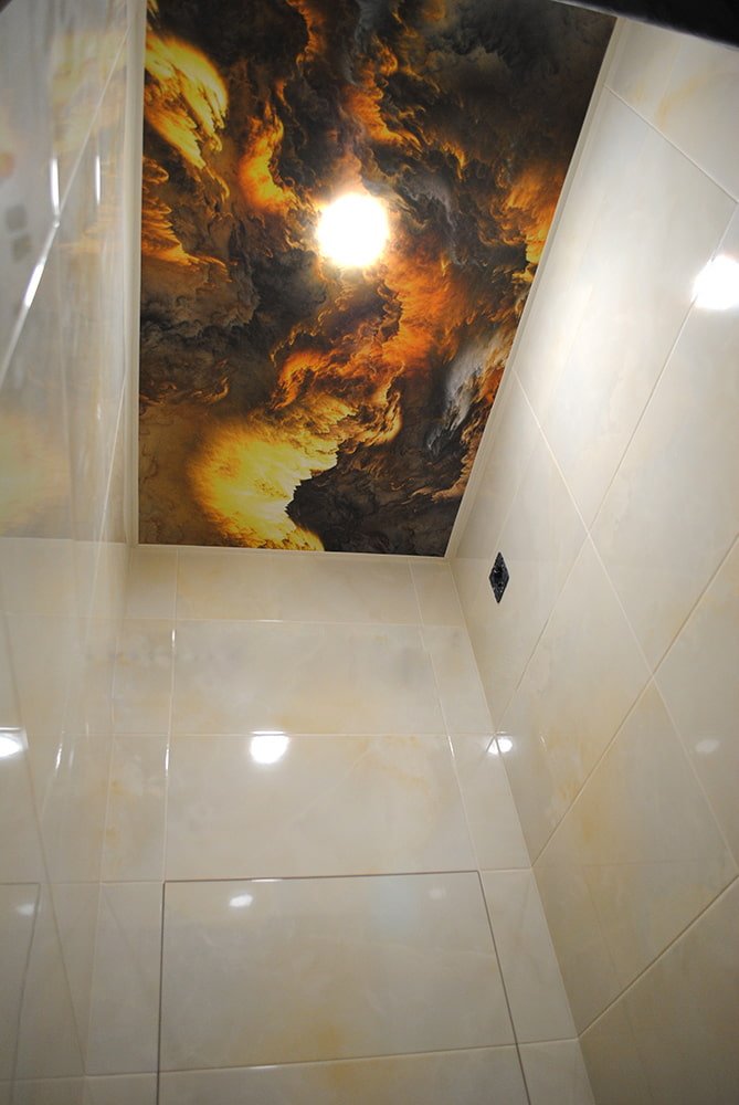 stretched ceiling with photo printing in the bathroom