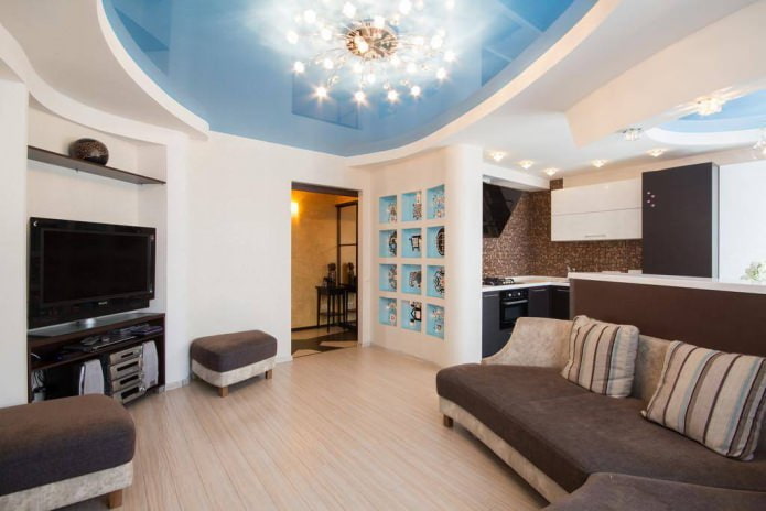 Stretch ceiling design in the kitchen-living room