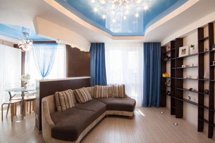 Stretch ceiling design in the kitchen-living room